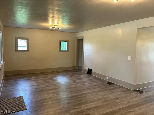 26 E Satin St, Jefferson, OH 44047 - unfurnished room with wood finished floors