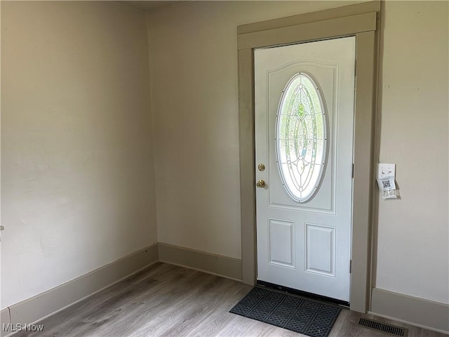 26 E Satin St, Jefferson, OH 44047 - foyer with wood finished floors and baseboards
