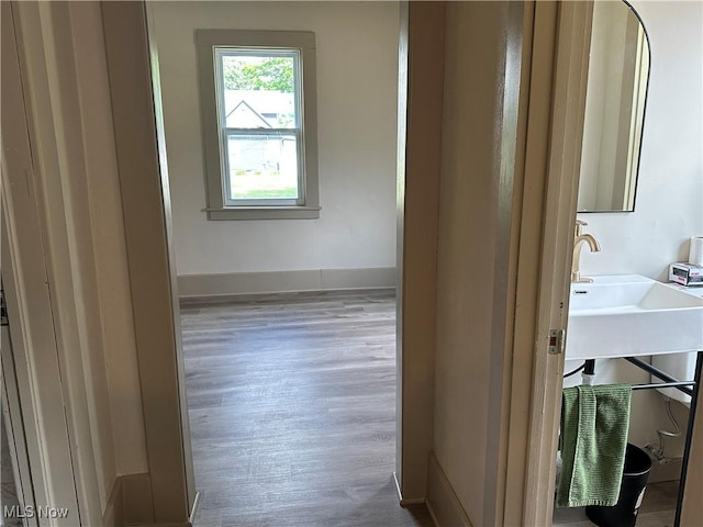 26 E Satin St, Jefferson, OH 44047 - corridor featuring wood finished floors and baseboards
