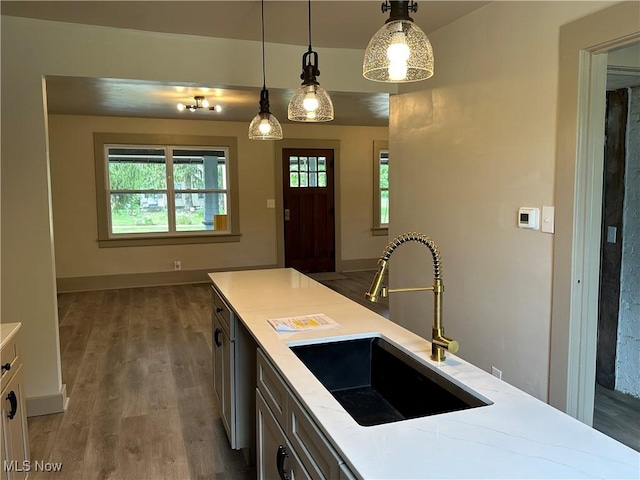 26 E Satin St, Jefferson, OH 44047 - kitchen with wood finished floors and pendant lighting