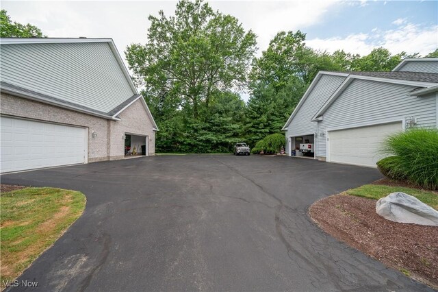 117 Nicklaus Dr NE, Warren, OH 44484 - view of property exterior with driveway