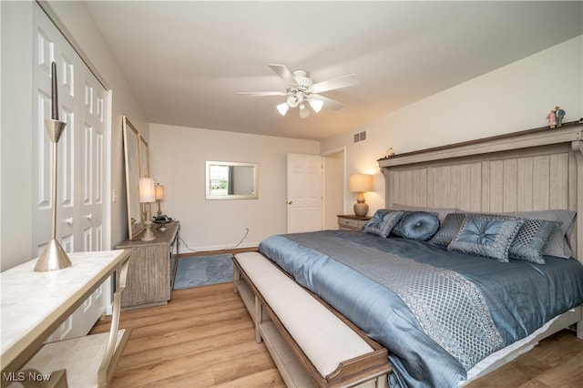 117 Nicklaus Dr NE, Warren, OH 44484 - bedroom with light wood-style flooring and ceiling fan