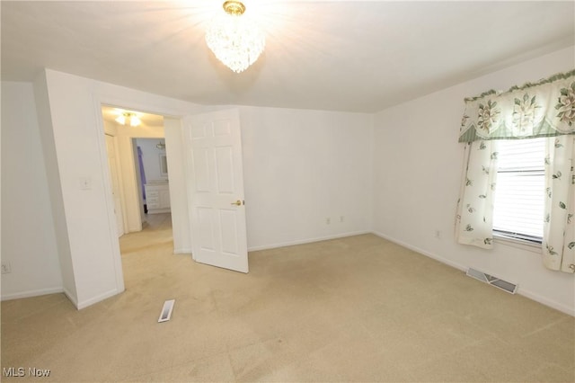 110 Wendt Way, Follansbee, WV 26037 - unfurnished room featuring light carpet and a chandelier
