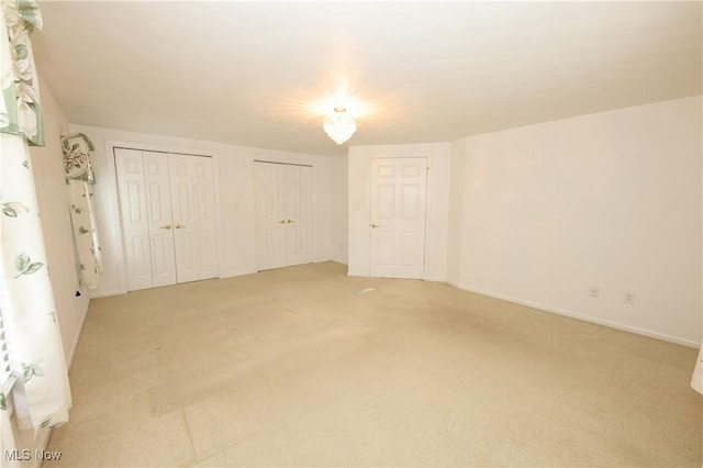 110 Wendt Way, Follansbee, WV 26037 - unfurnished bedroom with multiple closets and light carpet