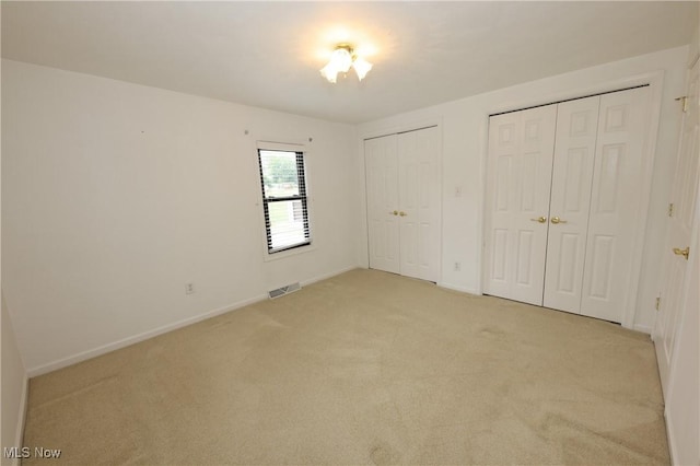 110 Wendt Way, Follansbee, WV 26037 - unfurnished bedroom with two closets and light colored carpet