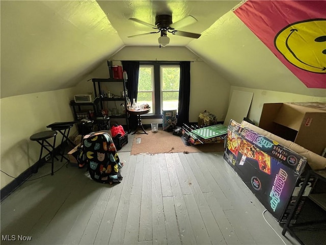 717 Calla Rd E, Poland, OH 44514 - additional living space with a ceiling fan, wood-type flooring, and lofted ceiling