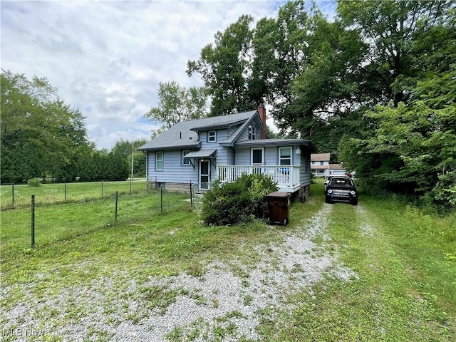 717 Calla Rd E, Poland, OH 44514 - view of front of house with a chimney