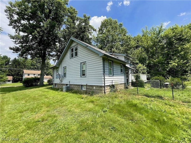 717 Calla Rd E, Poland, OH 44514 - view of home's exterior featuring a central AC unit