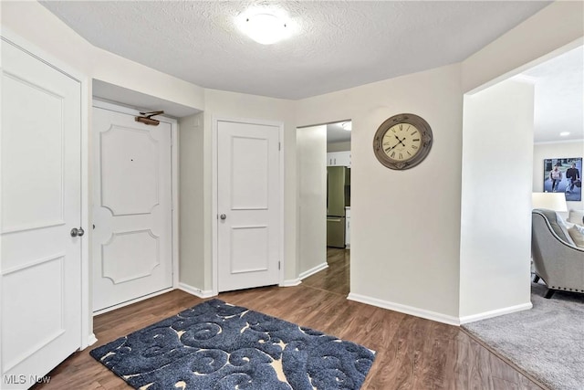1851 King James Unit 322, Westlake, OH 44145 - foyer with wood finished floors and a textured ceiling