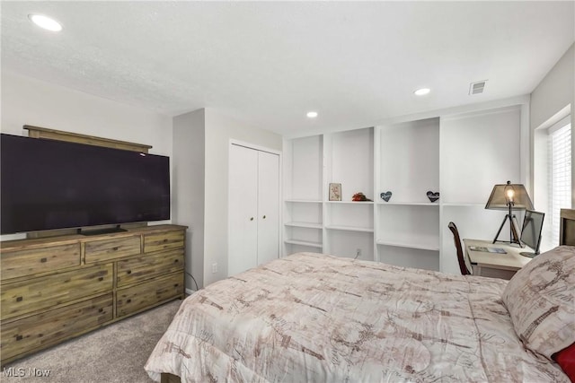 1851 King James Unit 322, Westlake, OH 44145 - bedroom featuring carpet floors, recessed lighting, and a closet