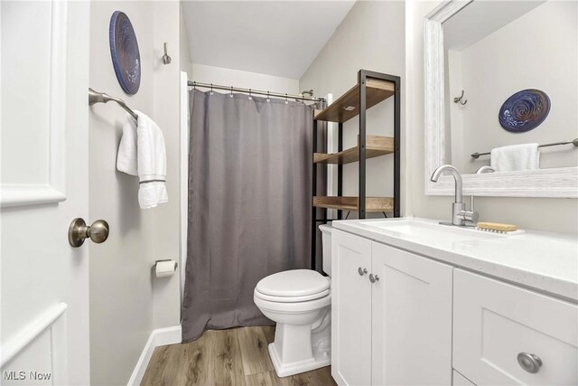 1851 King James Unit 322, Westlake, OH 44145 - full bath featuring wood finished floors, vanity, and curtained shower