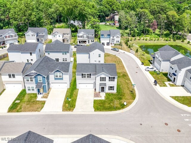 677 Crossings Ln, Akron, OH 44320 - aerial perspective of suburban area featuring a large body of water