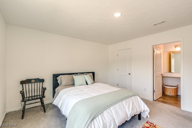 677 Crossings Ln, Akron, OH 44320 - carpeted bedroom with baseboards