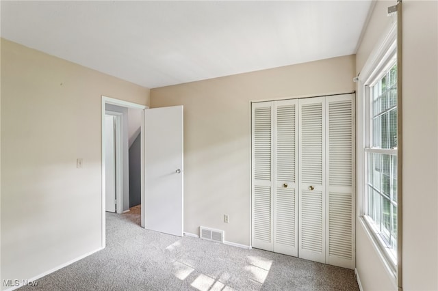 2331 Woodpark Rd, Fairlawn, OH 44333 - unfurnished bedroom featuring carpet flooring and a closet