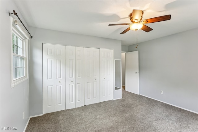 2331 Woodpark Rd, Fairlawn, OH 44333 - unfurnished bedroom with carpet, a closet, and a ceiling fan