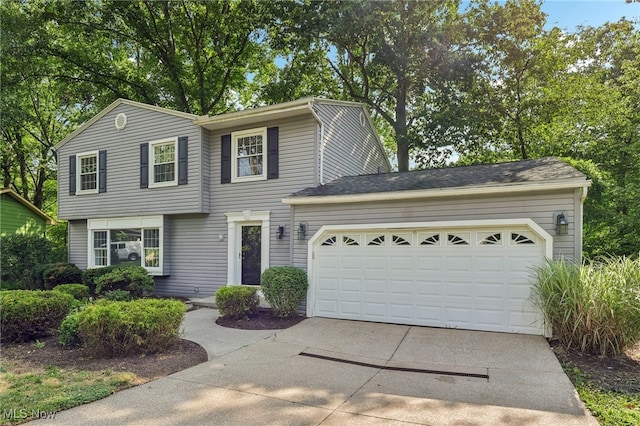 2331 Woodpark Rd, Fairlawn, OH 44333 - view of front of house featuring driveway and an attached garage