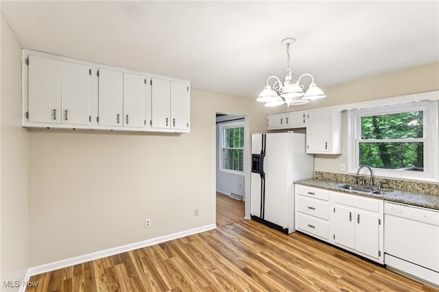 2331 Woodpark Rd, Fairlawn, OH 44333 - kitchen with white appliances, a chandelier, white cabinetry, and plenty of natural light
