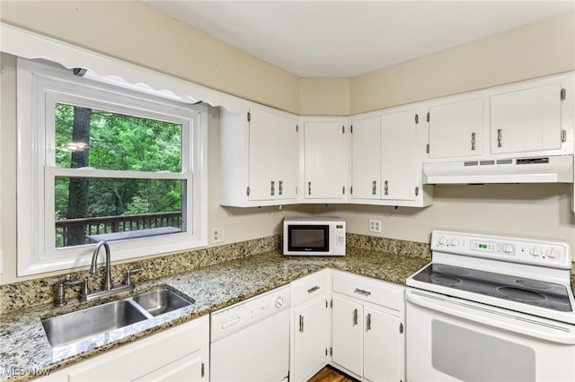 2331 Woodpark Rd, Fairlawn, OH 44333 - kitchen with under cabinet range hood, white appliances, white cabinets, and light stone counters