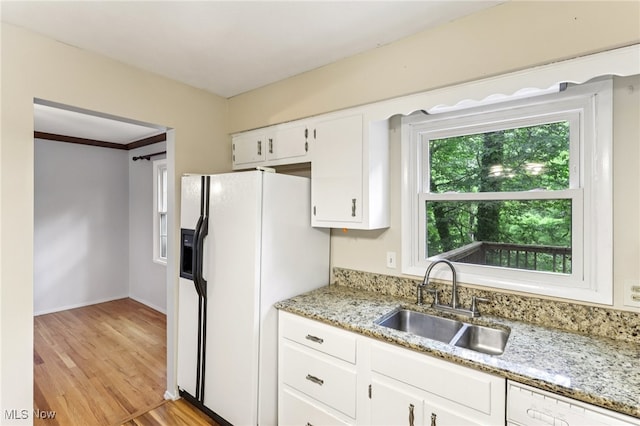 2331 Woodpark Rd, Fairlawn, OH 44333 - kitchen featuring white appliances, white cabinets, light wood-style floors, and light stone counters
