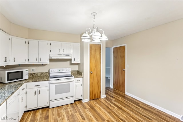 2331 Woodpark Rd, Fairlawn, OH 44333 - kitchen with white appliances, under cabinet range hood, a chandelier, light wood-style flooring, and white cabinetry