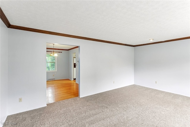 2331 Woodpark Rd, Fairlawn, OH 44333 - carpeted spare room with crown molding and a textured ceiling