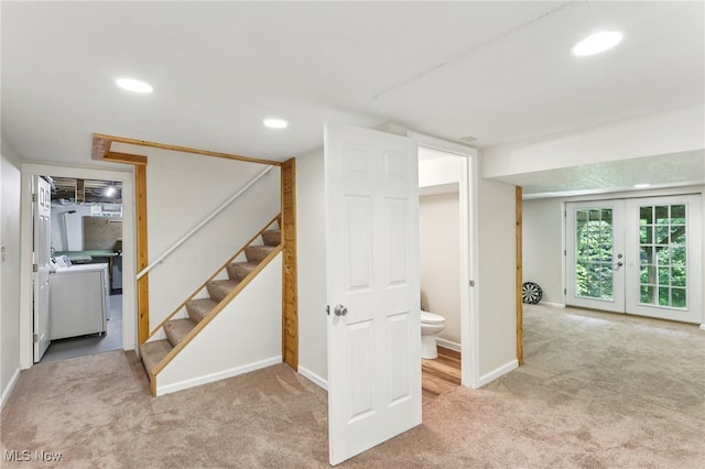 2331 Woodpark Rd, Fairlawn, OH 44333 - below grade area with carpet floors, washer and clothes dryer, stairway, recessed lighting, and french doors