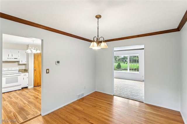 2331 Woodpark Rd, Fairlawn, OH 44333 - empty room featuring a chandelier, crown molding, and light wood-style floors
