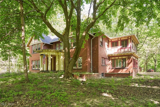 74 Maplewood Ave, Akron, OH 44313 - rear view of property with brick siding
