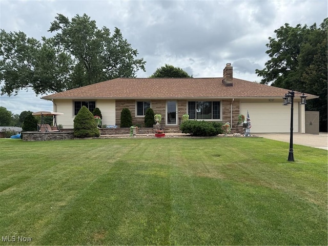 9237 Shephard Rd, Macedonia, OH 44056 - ranch-style house featuring a chimney, a garage, a front lawn, and concrete driveway