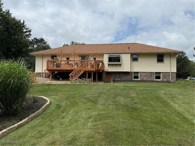 9237 Shephard Rd, Macedonia, OH 44056 - back of house featuring a wooden deck, stairs, and a lawn