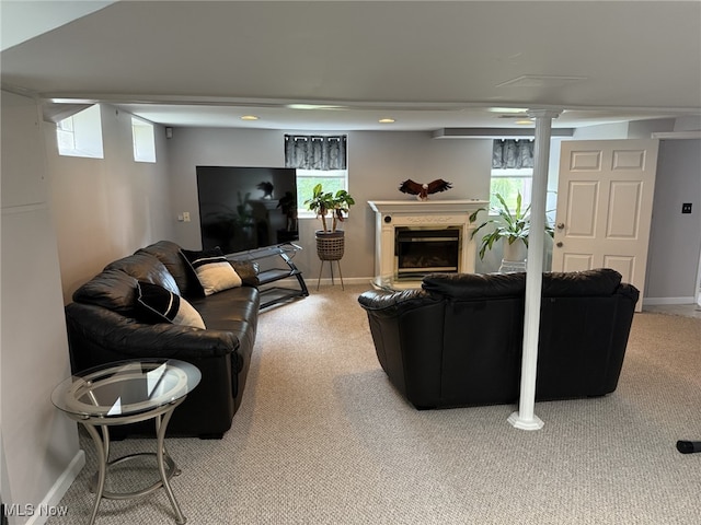 9237 Shephard Rd, Macedonia, OH 44056 - carpeted living room featuring decorative columns and a glass covered fireplace