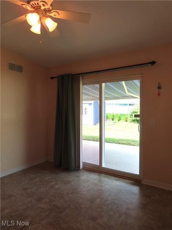 723 Whisper Creek Ln, Lodi, OH 44254 - spare room featuring baseboards and a ceiling fan