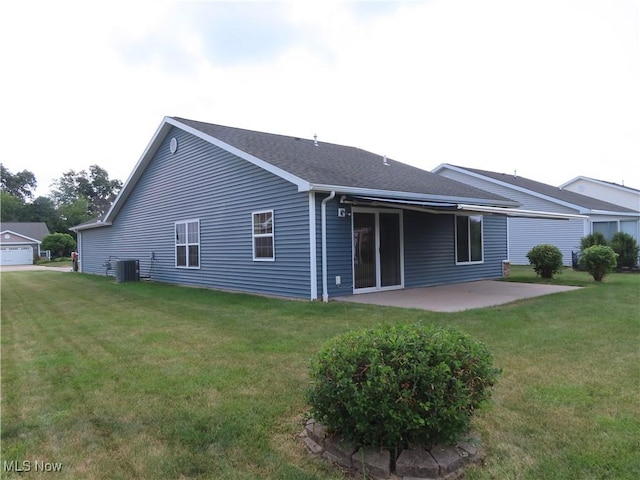 723 Whisper Creek Ln, Lodi, OH 44254 - back of property with a patio area and a lawn