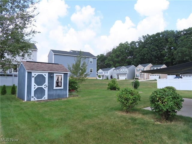 723 Whisper Creek Ln, Lodi, OH 44254 - view of green lawn with a storage unit and a residential view
