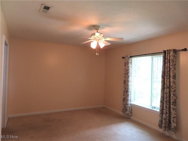 723 Whisper Creek Ln, Lodi, OH 44254 - unfurnished room with a ceiling fan, healthy amount of natural light, and light colored carpet