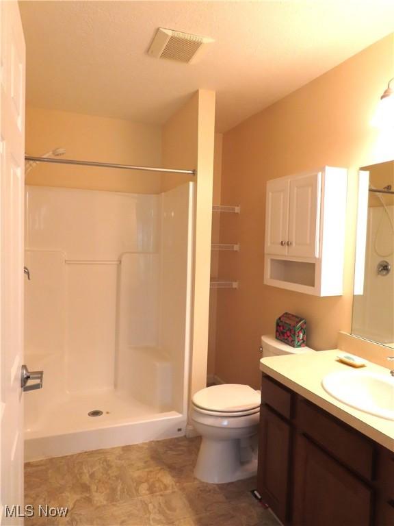 723 Whisper Creek Ln, Lodi, OH 44254 - bathroom featuring vanity and a shower