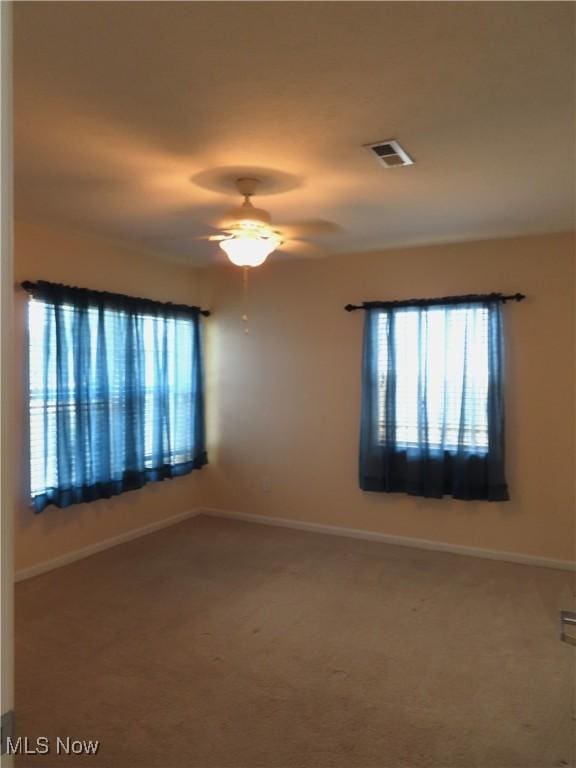 723 Whisper Creek Ln, Lodi, OH 44254 - empty room with a ceiling fan and carpet flooring