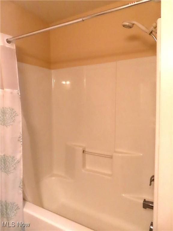 723 Whisper Creek Ln, Lodi, OH 44254 - bathroom with shower / bath combo with shower curtain
