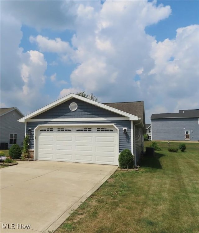 723 Whisper Creek Ln, Lodi, OH 44254 - view of front of home with a garage, a front yard, and concrete driveway