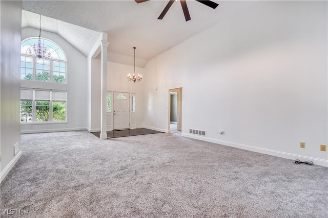 9798 Firestone Ln, Macedonia, OH 44056 - carpeted spare room featuring a chandelier, high vaulted ceiling, and a ceiling fan