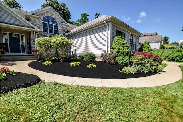 9798 Firestone Ln, Macedonia, OH 44056 - view of property exterior with stone siding