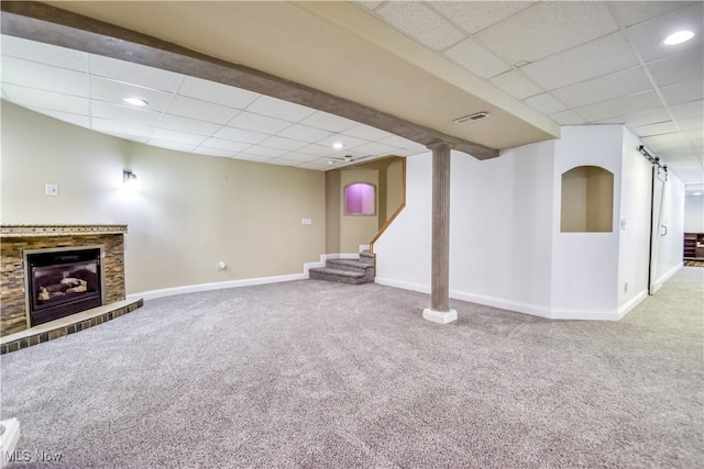 9798 Firestone Ln, Macedonia, OH 44056 - finished below grade area with a drop ceiling, carpet, a fireplace with raised hearth, stairway, and recessed lighting