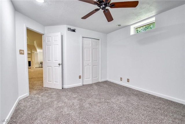 9798 Firestone Ln, Macedonia, OH 44056 - unfurnished bedroom featuring carpet floors, a closet, and a ceiling fan