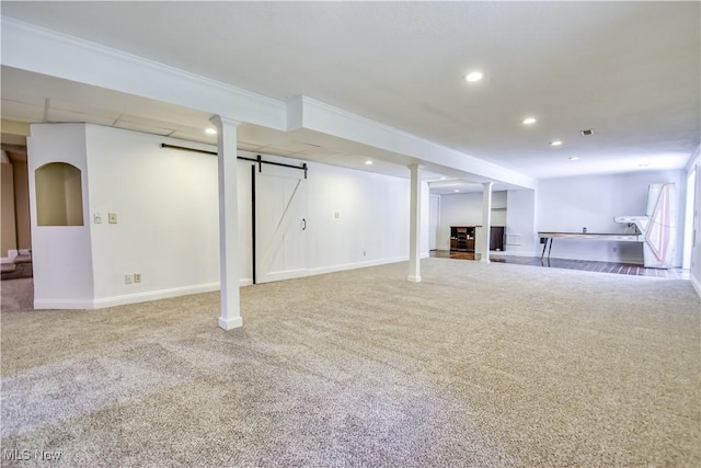 9798 Firestone Ln, Macedonia, OH 44056 - finished below grade area featuring carpet floors, a barn door, and recessed lighting