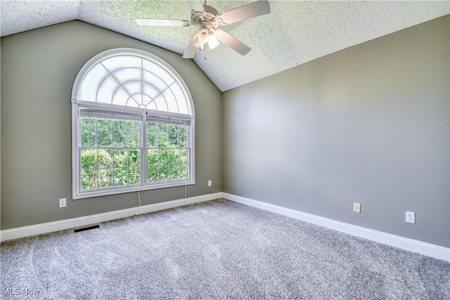 9798 Firestone Ln, Macedonia, OH 44056 - carpeted spare room with vaulted ceiling, a textured ceiling, and ceiling fan