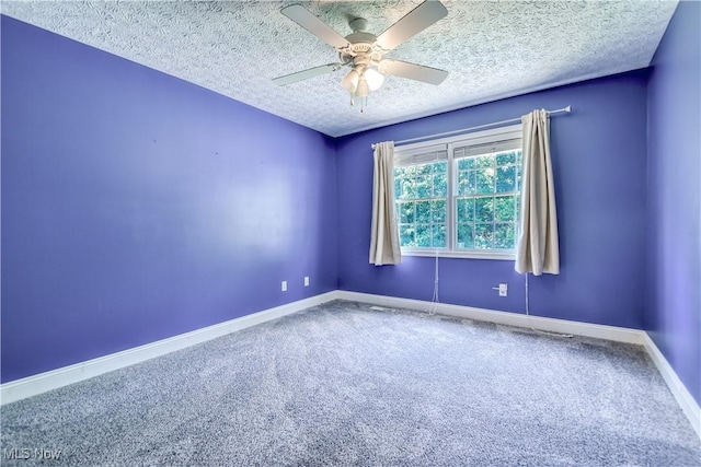 9798 Firestone Ln, Macedonia, OH 44056 - spare room with carpet flooring, a textured ceiling, and a ceiling fan
