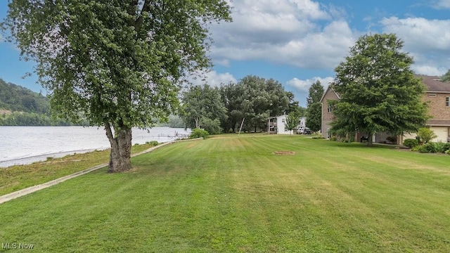 390 Powell Riverfront Rd, Saint Marys, WV 26170 - view of green lawn featuring a water view
