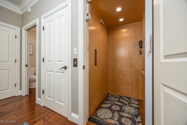 390 Powell Riverfront Rd, Saint Marys, WV 26170 - corridor featuring elevator, wood finished floors, ornamental molding, and recessed lighting