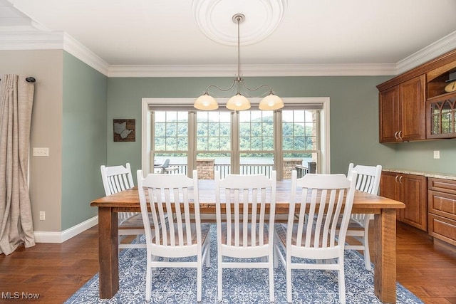 390 Powell Riverfront Rd, Saint Marys, WV 26170 - dining room with plenty of natural light, dark wood finished floors, and ornamental molding