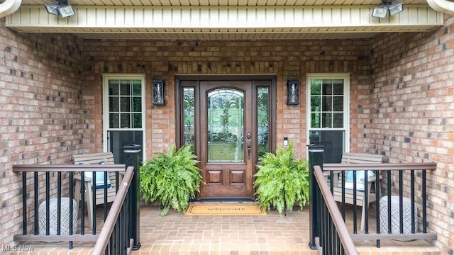 390 Powell Riverfront Rd, Saint Marys, WV 26170 - property entrance featuring brick siding and a porch